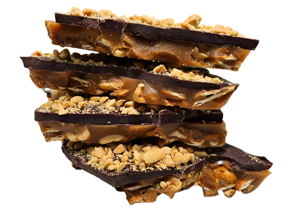Mouthwatering toffee layered over whole pretzels, peanut butter drizzled with peanut butter and topped with a generous layer of chocolate and sprinkled with chopped peanuts